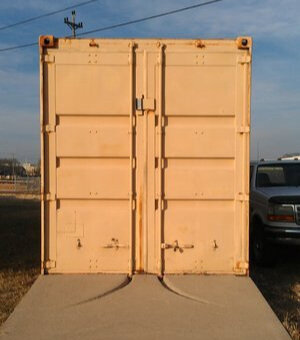 Cement ramp made with indentations for the lockrods so the doors can open