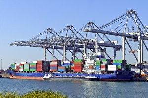 Containers being loaded onto ships