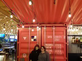 Katie+and+Julia+in+front+of+a+Super+Cubes+container+used+for+interior+design