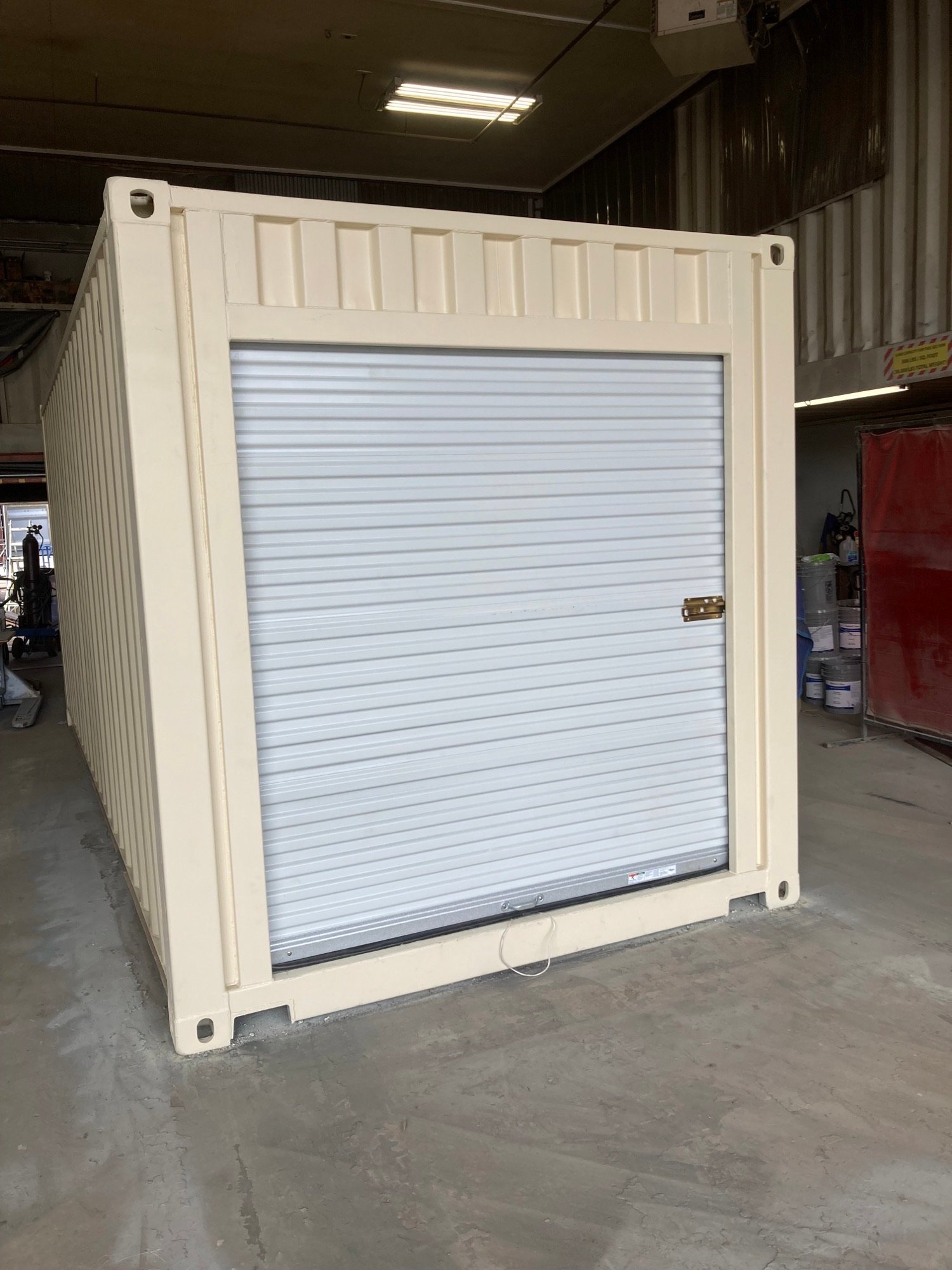 shipping container with roll on door