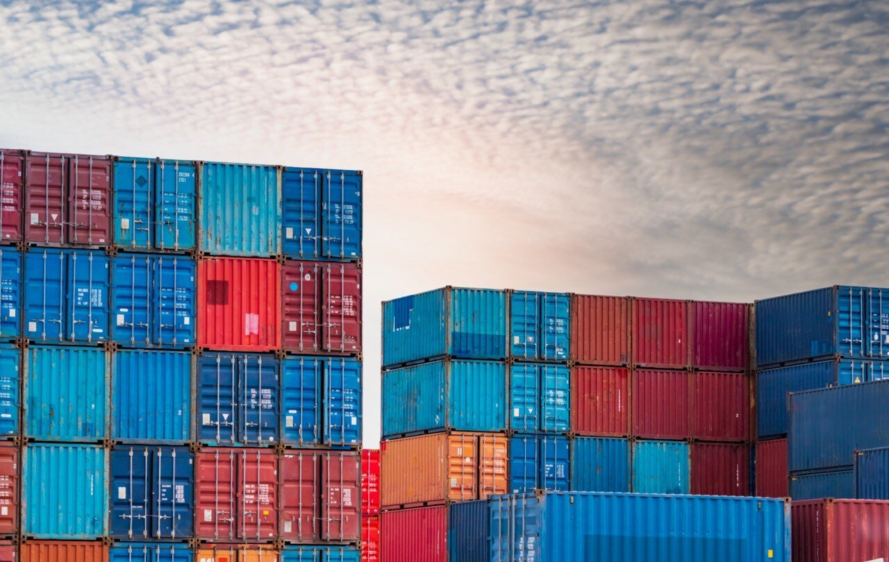 colorful shipping containers for sale stacked high