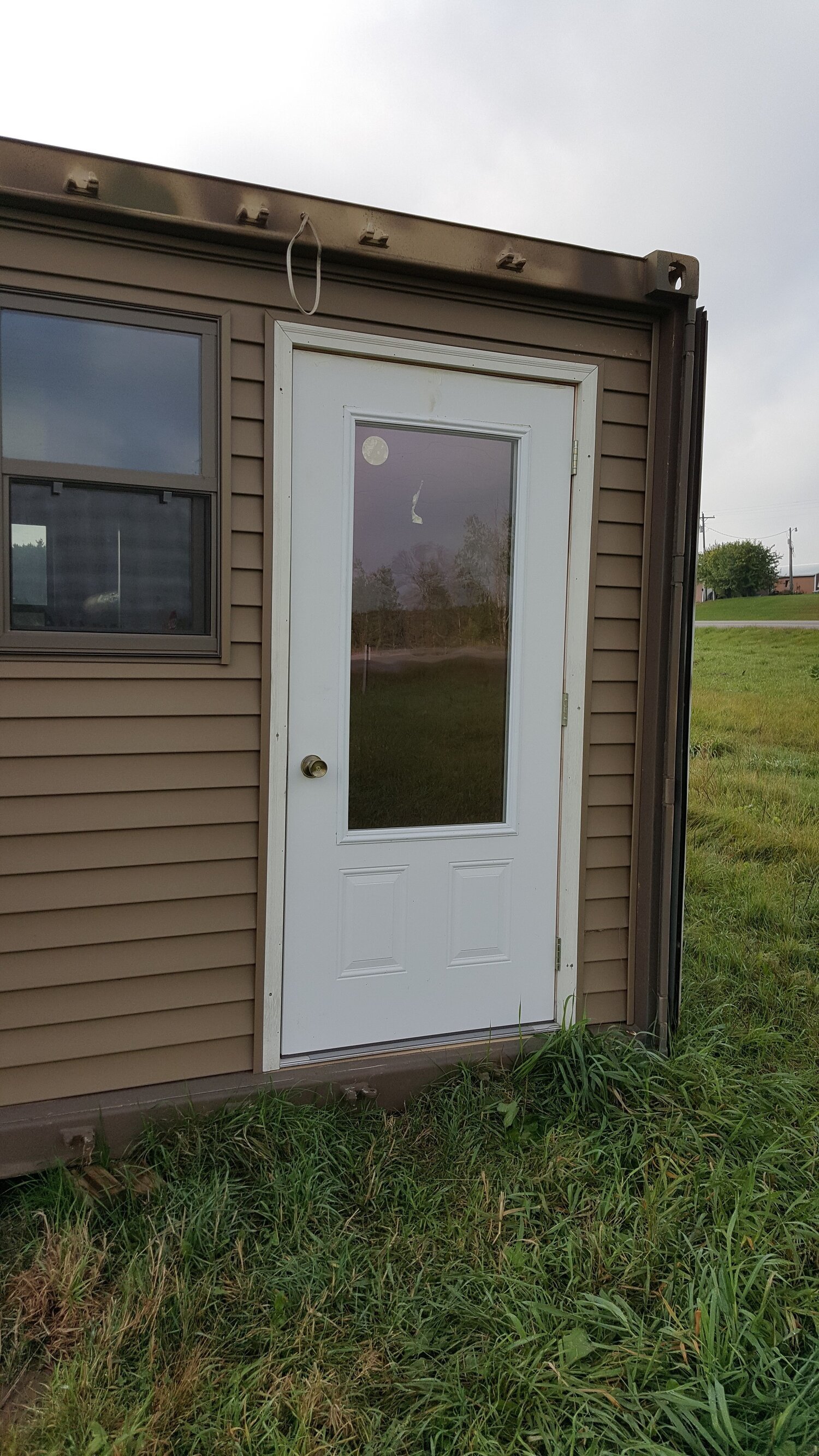 a screen door on a shipping container
