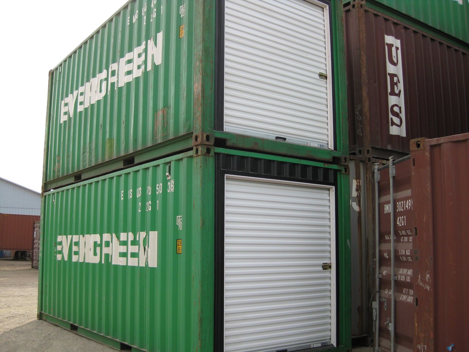two green containers stacked