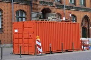 an orange container used on a jobsite