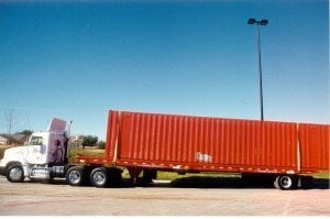 shipping container on a tilt bed