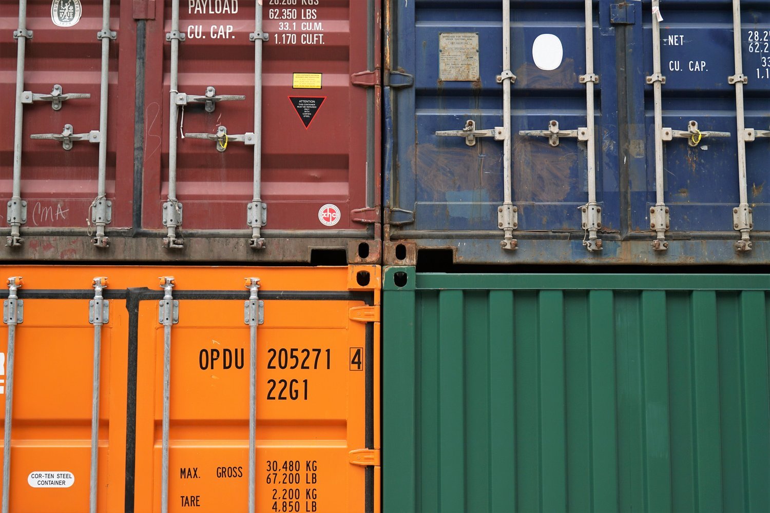 4 colored containers stacked 2 wide