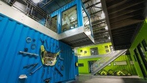 blue and lime green containers at a workshop