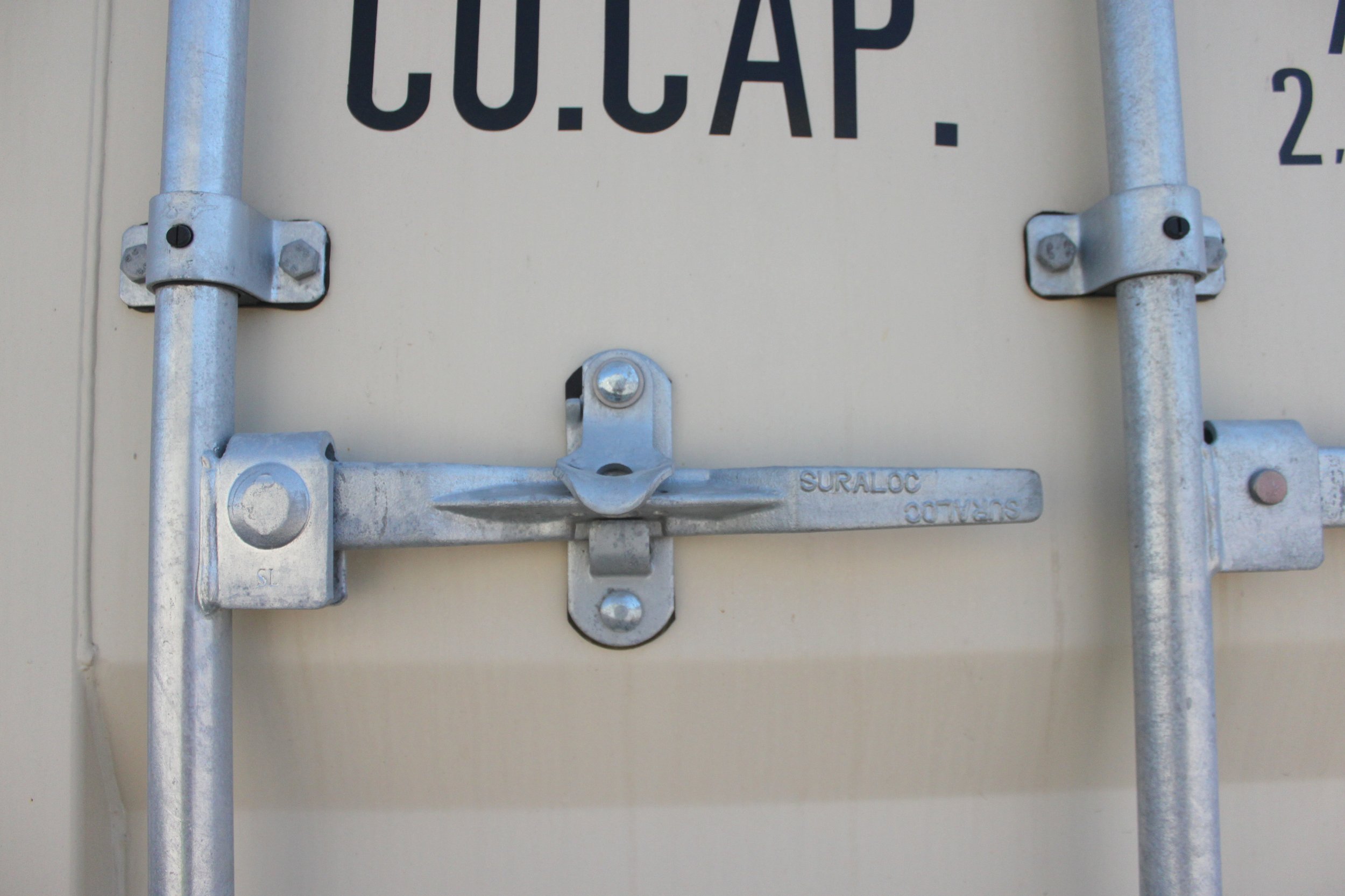 Container lever secured with securement loops