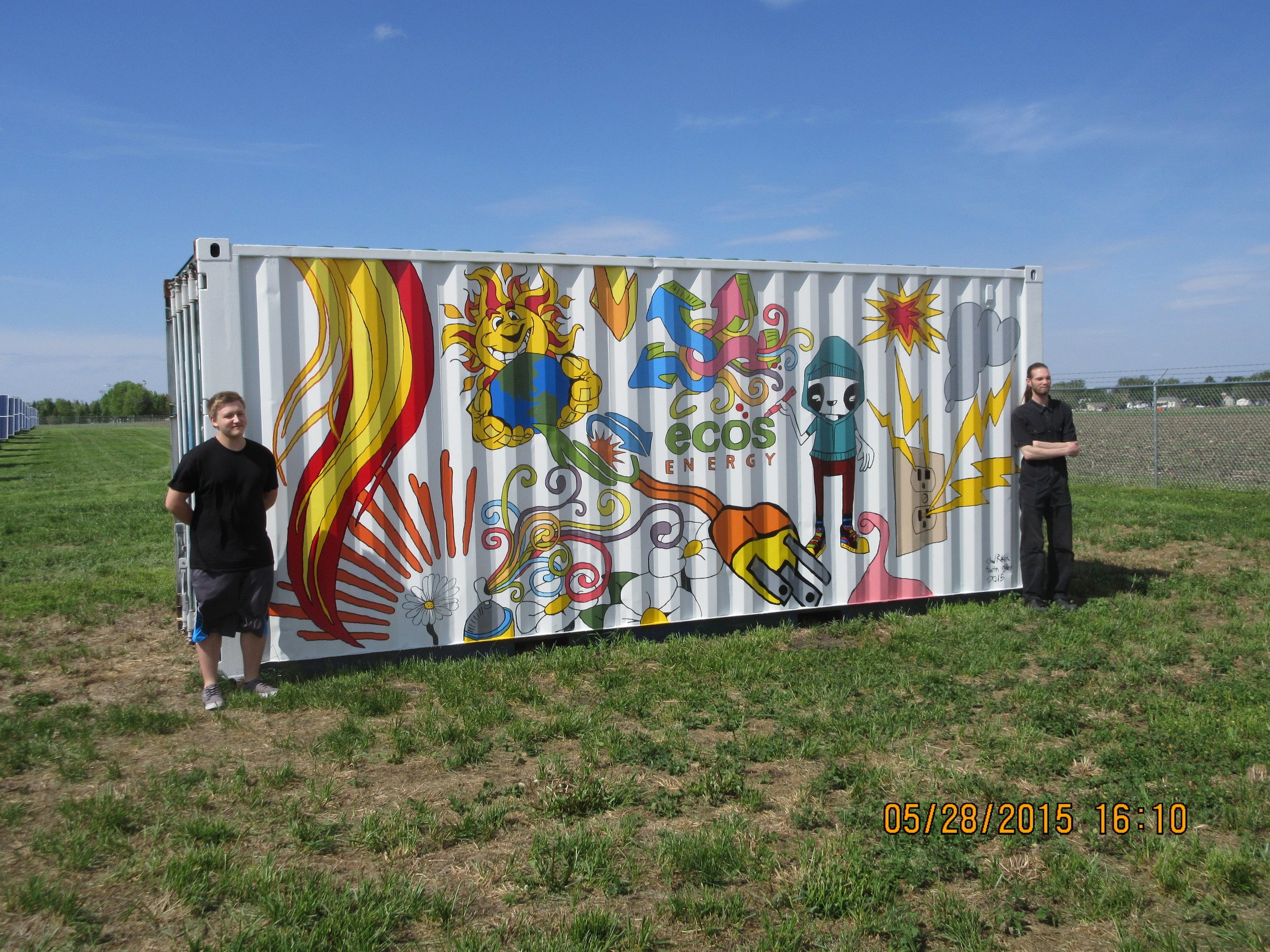 Chad Reker and Austin Miller in front of their container design