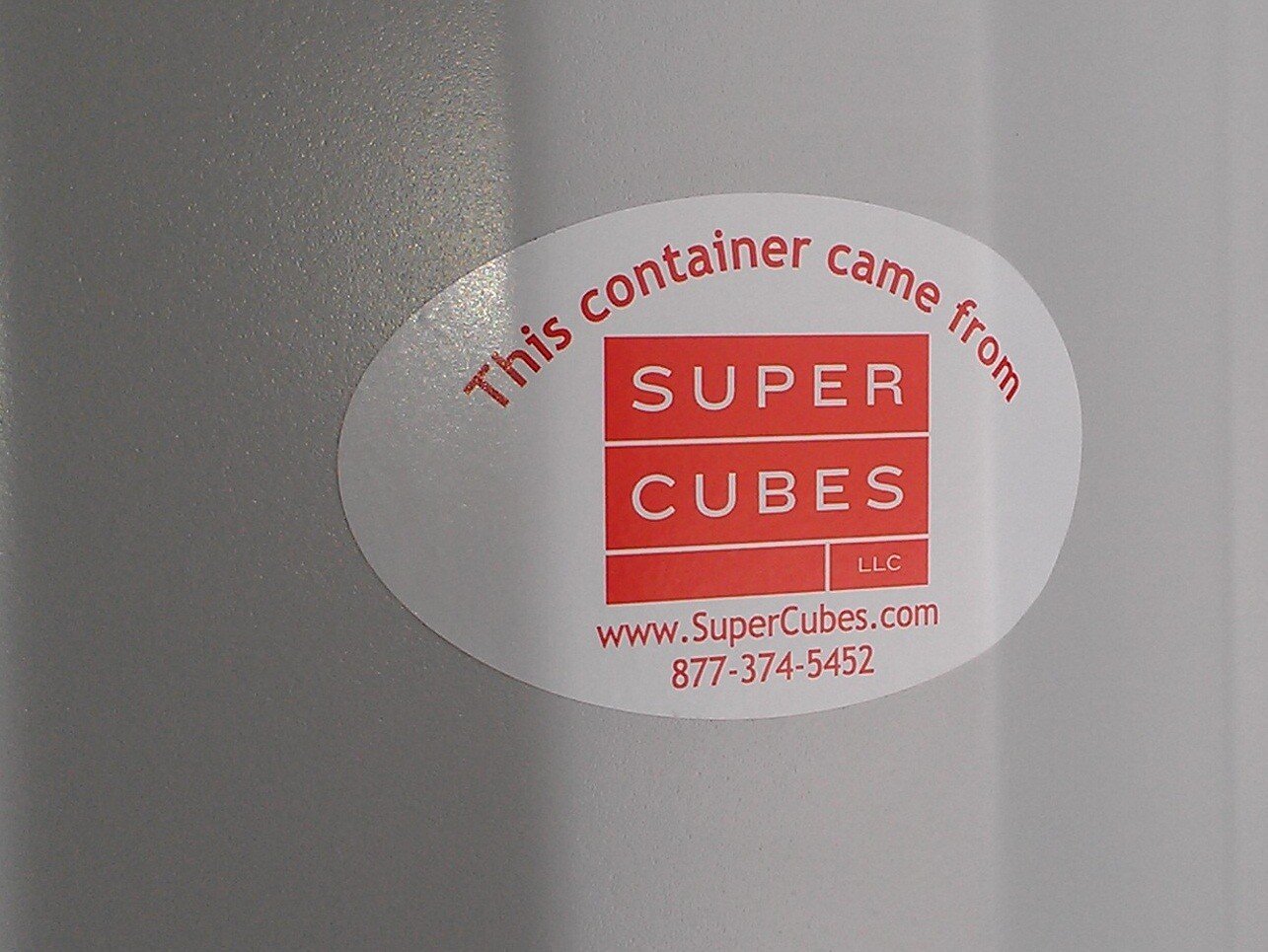 Super Cubes stick on side of shipping container